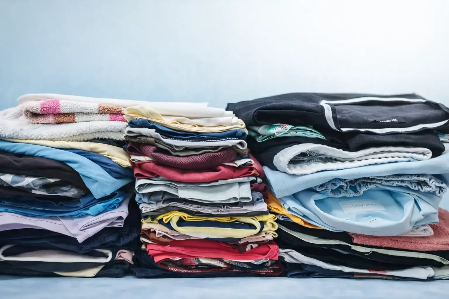 Folded clean clothes for laundry service in Chandigarh